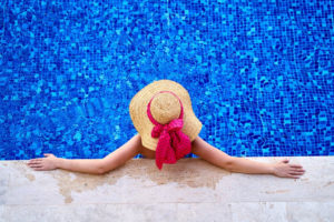 person sitting in pool